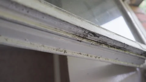 Dirty Old Wooden Window Frame Bottom Edge with Black Soot and Peeling Paint Stock Footage 335598824