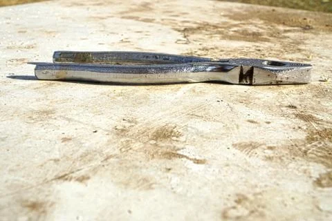 Dirty Pliers On Table Stock Photos