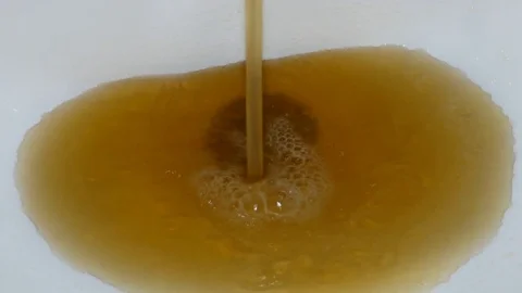 Dirty polluted running water Stock Footage 72765657