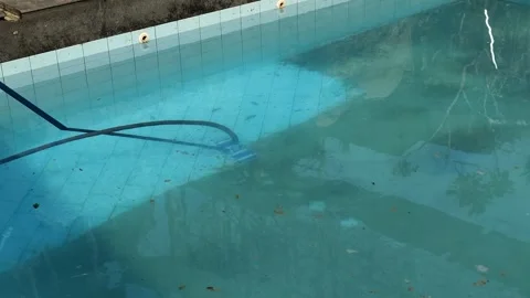 A dirty pool being cleaned Video stock 285096985