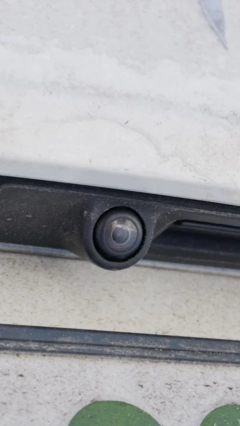 Dirty Rear View Camera Lens On White Car Bumper In Macro Detail 스톡 동영상 329804982