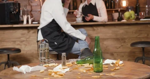 Dirty restaurant floor and table after a busy day Stock Footage 104868734
