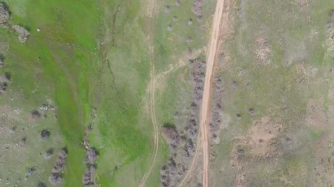 Dirty road in the grass. Stock Footage 273364843