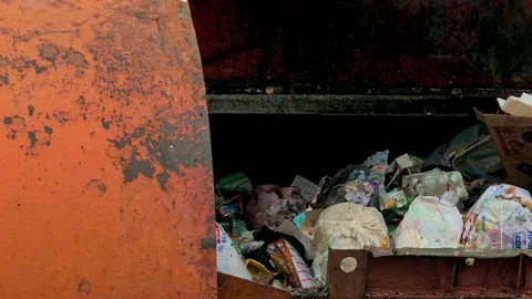 Dirty Robotic Arm of Side Loader Garbage Truck Throws Junk Into Waste Container Stock Footage 105139484