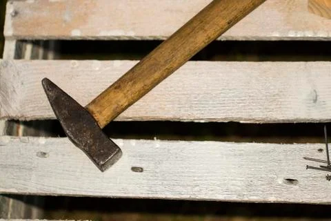 Dirty set of hand tools on old rusted sheet metal ,add your text on white bac Stock Photos