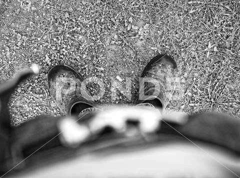 Dirty shoes in spring in Russia Stock Photos