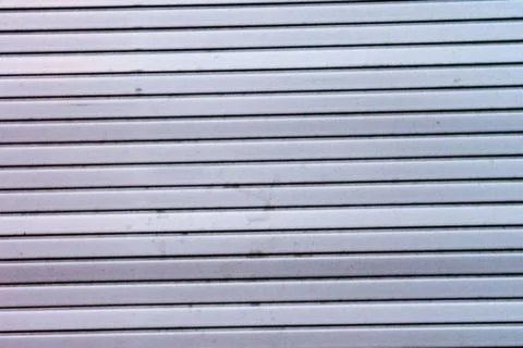 Dirty shutter close up grey store front Stock Photos