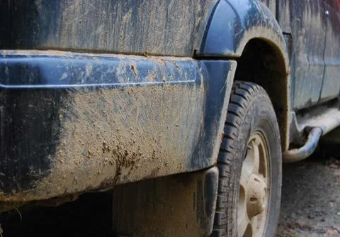 Dirty side of a black car after a road trip Foto stock