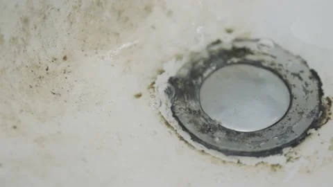 Dirty sink drain or wash mesh hole with rust and grunge. Stock-Footage 196663449