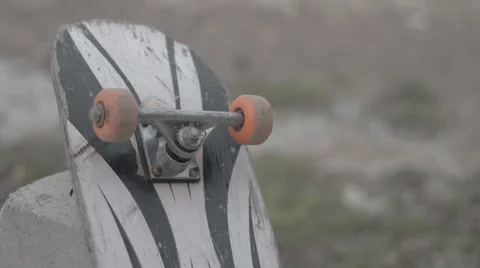 Dirty Skateboard on Brick Stock Footage
