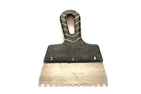 Dirty spatula on a white background Stock Photos