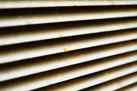 Dirty stained metallic jalousie pattern close up, abstract rusty stripes Stock Photos