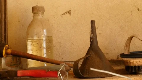 Dirty stuff on shelf in old garage Stock Footage 88918770