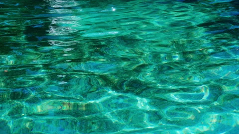 Dirty swimming pool water surface with shimmering caustic light reflections.. Stock Footage 335283476