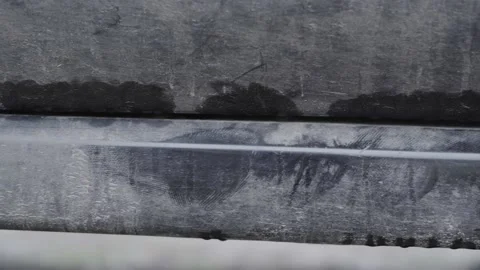 Dirty threshold of the car close-up. Reagents for road surface on a car body Stock Footage 148086118