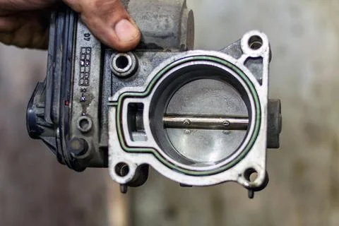 Dirty throttle valve cleaning process repair service automobile car engine Stock Photos
