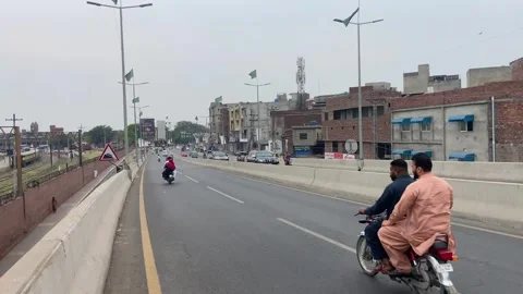Dirty traffic making rush on roads in Lahore Pakistan on March 18, 2024 스톡 동영상 273094751