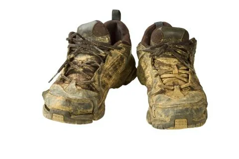 Dirty trainers Stock Photos