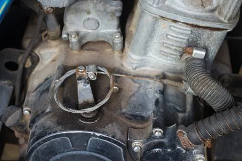 Dirty vehicle engine components due to late engine oil changes Stock Photos