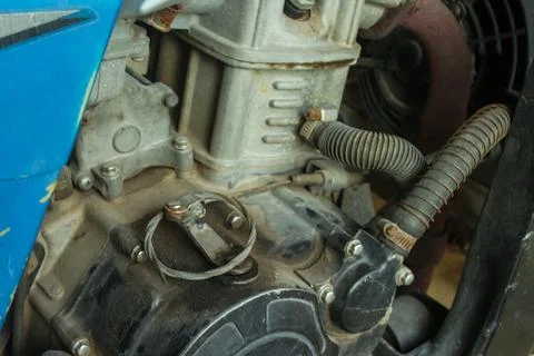 Dirty vehicle engine components due to late engine oil changes Stock Photos
