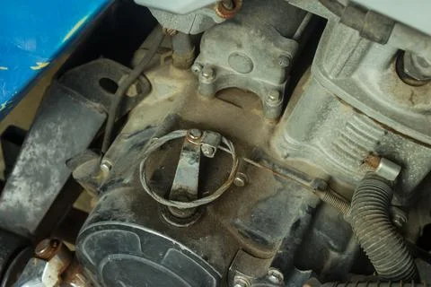 Dirty vehicle engine components due to late engine oil changes Stock Photos