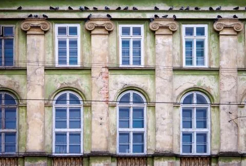 Dirty wall with windows Stock Photos