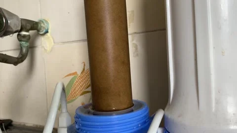 Dirty water purifier micro filter 0.3 micron close up view at home Stock Footage 250439650