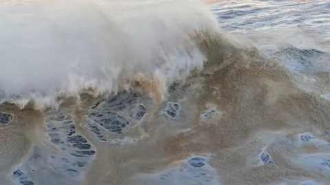 Dirty wave breaking Stock Footage 88620426