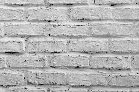 Dirty white brick wall pattern background Stock Photos