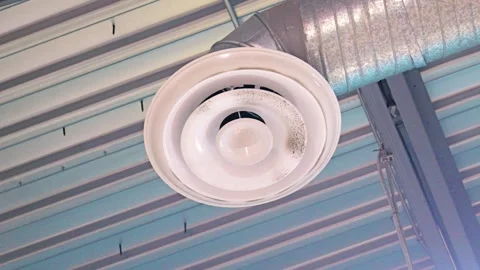 Dirty white circular air vent diffuser with dust build 库存影片 334390857
