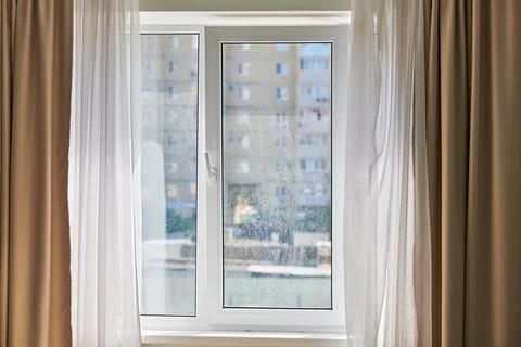 Dirty window in apartment Stock Photos