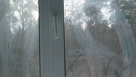 Dirty windows Preparation for cleaning double-glazed windows dust on the windows Stock Footage 235930910