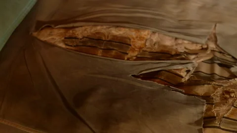 Dirty, wrinkled, unmade bed Stockbeeldmateriaal 302114550