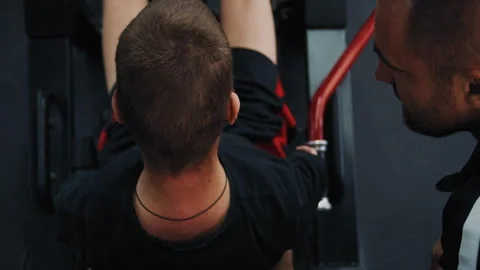 Disabled Athlete Performing Leg Press With Trainer Support Stock-Footage 322016613