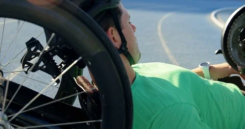 Disabled athlete using smartwatch on a running track 4k Stock Footage 96094526
