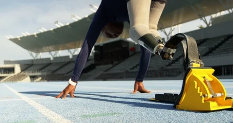 Disabled athletic running on a running track 4k Stock Footage 96094545