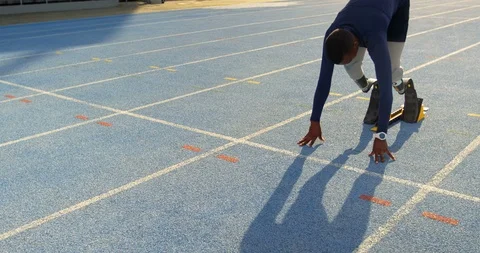 Disabled athletic running on a running track 4k Stock Footage 96094571