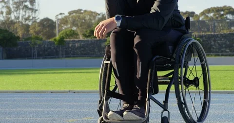 Disabled athletic talking on mobile phone 4k Stock Footage 96094512