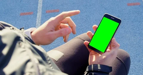 Disabled athletic using mobile phone at sports venue 4k Stock Footage 96094497