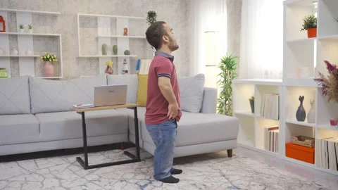 Disabled dwarf young man wanders home thoughtfully, confused  Stock Footage 230968228