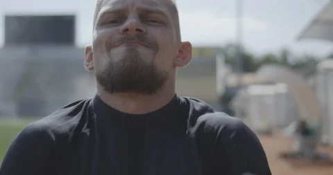 Disabled man lifting kettlebell Stock Footage 116765232