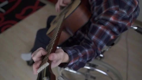A disabled man is playing the guitar Stock Footage 202314325