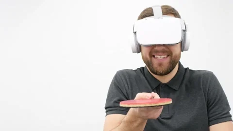 A disabled man plays digital ping pong using virtual reality technology. Table Stock Footage 222642547