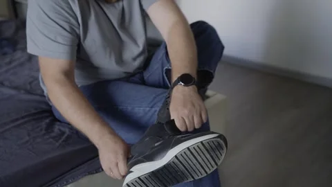 Disabled Man Putting on Sneaker over Prosthetic Leg at Home 스톡 동영상 317899026