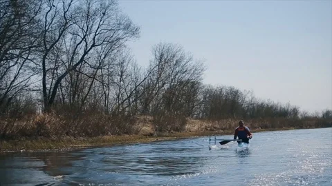 Disabled man rowing on the river in a canoe. Rowing, canoeing, paddling Stock-Footage 112238898