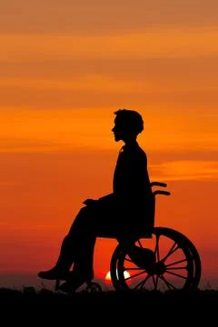 Disabled man on a wheelchair at sunset Stock Illustration