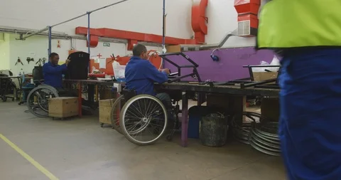 Disabled men at work Stock Footage 124591643