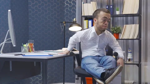 Disabled midget man working in office unhappy and thoughtful. Video stock 230980705