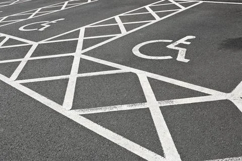 Disabled parking space Stock Photos