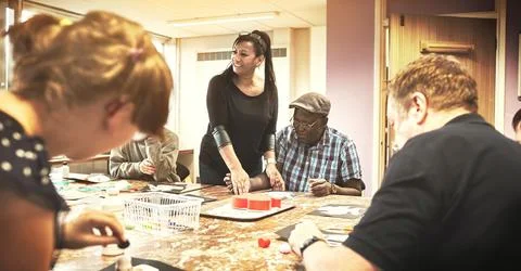 Disabled people with learning disability at community healthcare institution Stock Photos